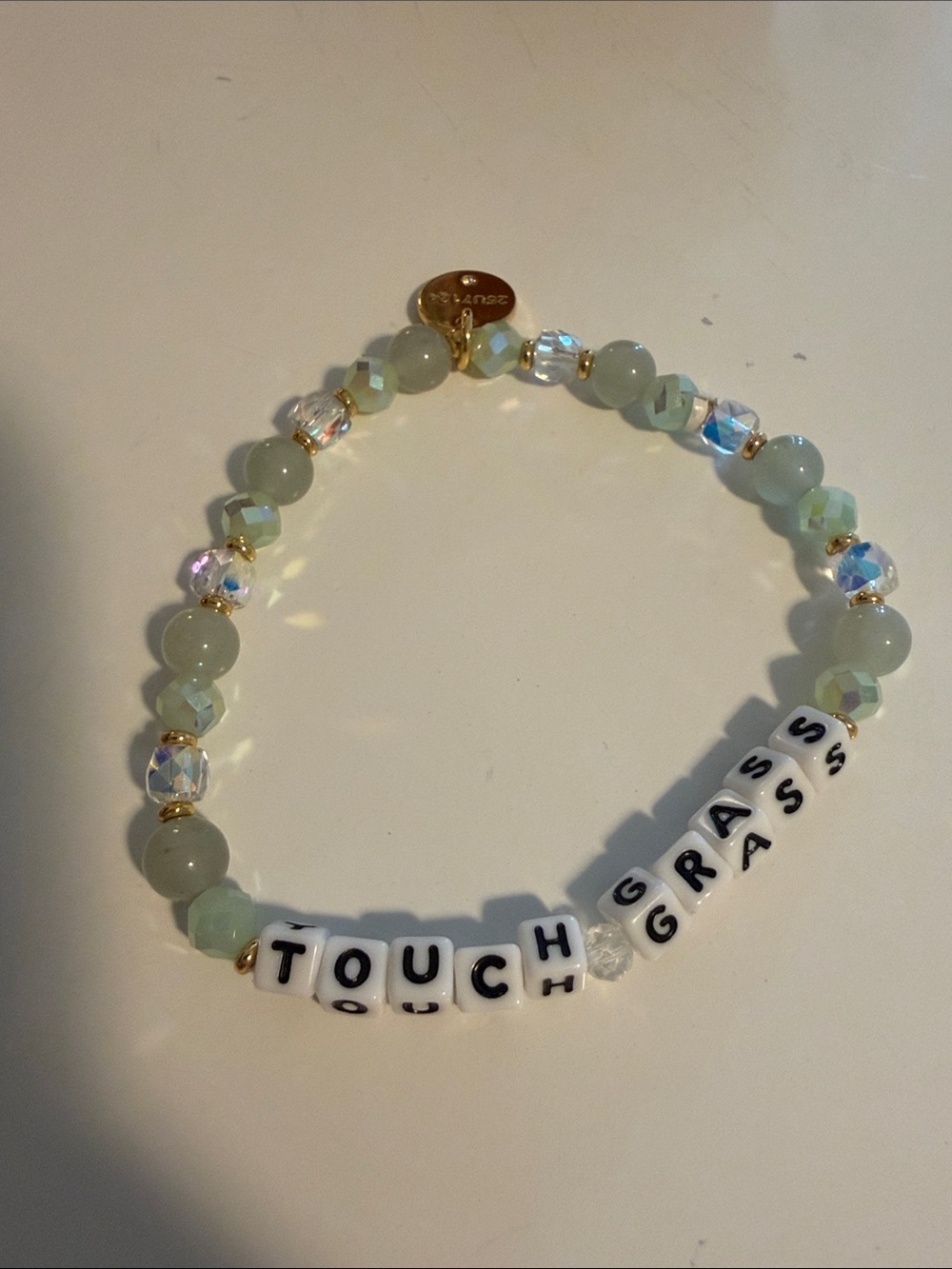 Little Words Project 'TOUCH GRASS' Stretch Bracelet in Light Green M/L
